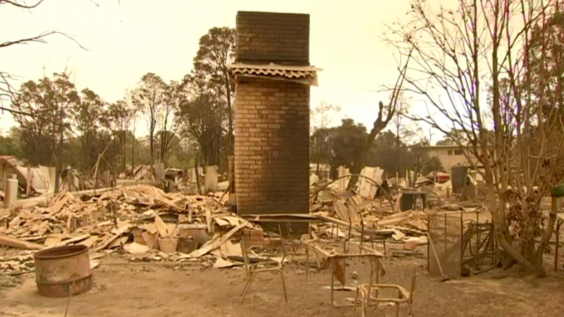 Ett nedbränt hus i Mallacoota i nordöstra Victoria.
