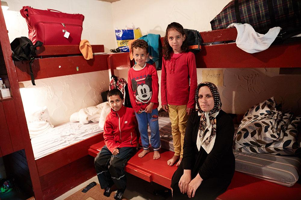 Noris Rasoli, 34 år, med barnen Yosef 11, Mahdia 8, och Jones 6.