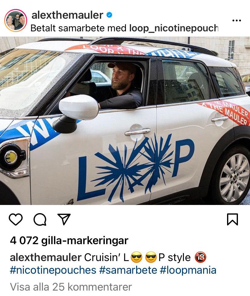 MMA-stjärnan Alexander ”The Mauler” Gustafsson sitter i en Loop-sponsrad bil i ett reklaminlägg. 