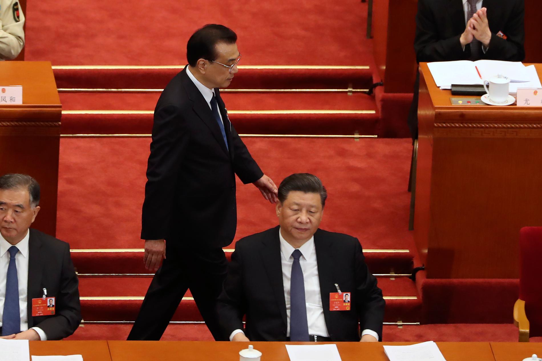 Kinas president Xi Jinping. I bakgrunden premiärminister Li Keqiang. Arkivbild.