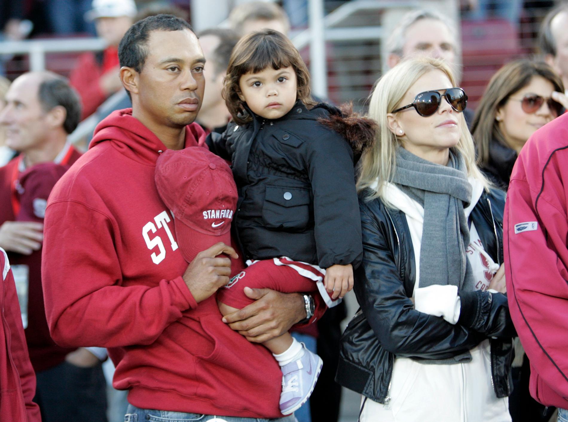 Tiger Woods och Elin Nordegren med dottern Sam Alexis.