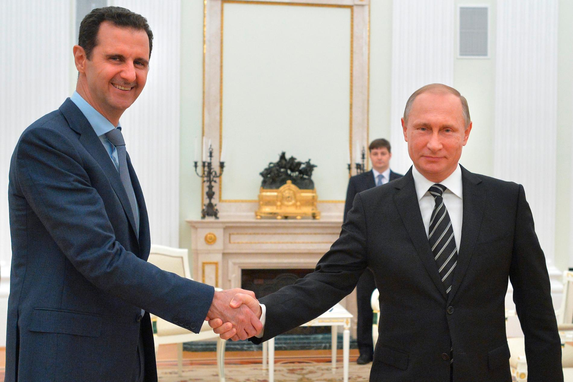 Syriens president Bashar al- Assad och Rysslands president Vladimir Putin.