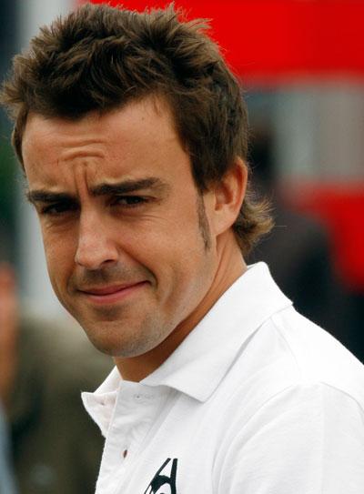 Nöjd Fernando Alonso känner sig tillfreds med att vara klar för Ferrari redan från nästa år. FOTO: AP